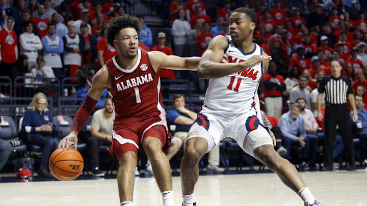 Feb 28, 2024; Oxford, Mississippi, USA; Alabama Crimson Tide guard Mark Sears (1) drives to the basket as Mississippi Rebels guard Matthew Murrell (11) defends during the first half at The Sandy and John Black Pavilion at Ole Miss. Mandatory Credit: Petre Thomas-Imagn Images Feb 28, 2024; Oxford, Mississippi, USA; Alabama Crimson Tide guard Mark Sears (1) drives to the basket as Mississippi Rebels guard Matthew Murrell (11) defends during the first half at The Sandy and John Black Pavilion at Ole Miss. Mandatory Credit: Petre Thomas-Imagn Images