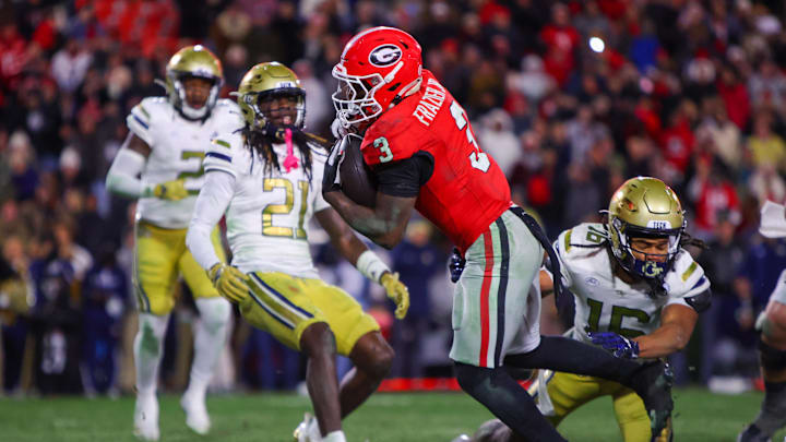 Nov 29, 2024; Athens, Georgia, USA; Georgia Bulldogs running back Nate Frazier (3) scores the game winning two-point conversion against the Georgia Tech Yellow Jackets in the eighth overtime at Sanford Stadium. Mandatory Credit: Brett Davis-Imagn Images
Nov 29, 2024; Athens, Georgia, USA; Georgia Bulldogs running back Nate Frazier (3) scores the game winning two-point conversion against the Georgia Tech Yellow Jackets in the eighth overtime at Sanford Stadium. Mandatory Credit: Brett Davis-Imagn Images