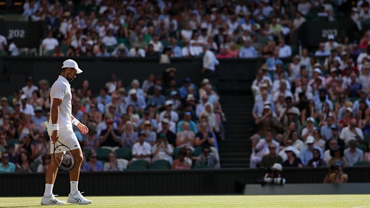 A clearly-compromised Djokovic was overwhelmed by Sinner in straight sets. 