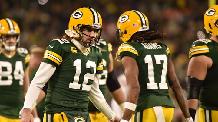 Jan 22, 2022; Green Bay, Wisconsin, USA; Green Bay Packers quarterback Aaron Rodgers (12) and wide receiver Davante Adams (17) in action against the San Francisco 49ers during a NFC Divisional playoff football game at Lambeau Field. Mandatory Credit: Jeffrey Becker-Imagn Images
