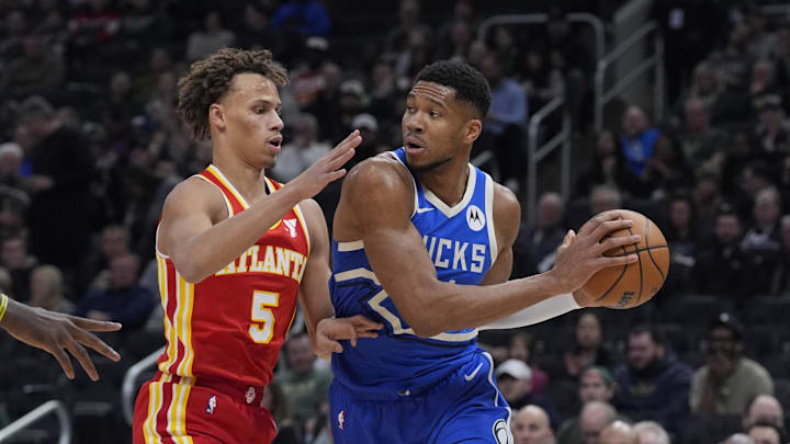 Dec 4, 2024; Milwaukee, Wisconsin, USA; Milwaukee Bucks forward Giannis Antetokounmpo (34) drives against Atlanta Hawks guard Dyson Daniels (5) in the first half at Fiserv Forum. Mandatory Credit: Michael McLoone-Imagn Images Dec 4, 2024; Milwaukee, Wisconsin, USA; Milwaukee Bucks forward Giannis Antetokounmpo (34) drives against Atlanta Hawks guard Dyson Daniels (5) in the first half at Fiserv Forum. Mandatory Credit: Michael McLoone-Imagn Images