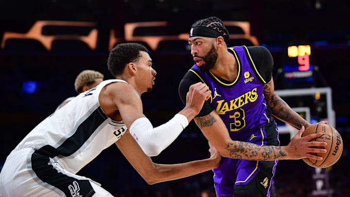 Feb 23, 2024; Los Angeles, California, USA; Los Angeles Lakers forward Anthony Davis (3) moves the ball against San Antonio Spurs center Victor Wembanyama (1) during the first half at Crypto.com Arena. Mandatory Credit: Gary A. Vasquez-Imagn Images Feb 23, 2024; Los Angeles, California, USA; Los Angeles Lakers forward Anthony Davis (3) moves the ball against San Antonio Spurs center Victor Wembanyama (1) during the first half at Crypto.com Arena. Mandatory Credit: Gary A. Vasquez-Imagn Images