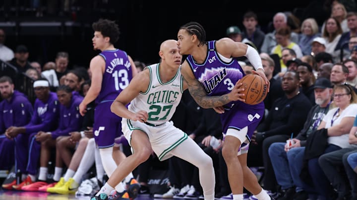 Dec 30, 2025; Salt Lake City, Utah, USA; Utah Jazz guard Keyonte George (3) looks to pass against Boston Celtics guard Jordan Walsh (27) during the first half at Delta Center. Mandatory Credit: Rob Gray-Imagn Images