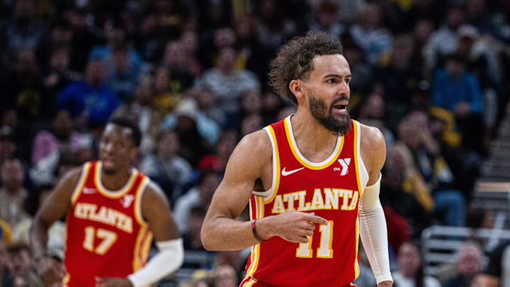 Feb 1, 2025; Indianapolis, Indiana, USA; Atlanta Hawks guard Trae Young (11) celebrates after a basket against the Indiana Pacers in the second half at Gainbridge Fieldhouse. Mandatory Credit: Trevor Ruszkowski-Imagn Images Feb 1, 2025; Indianapolis, Indiana, USA; Atlanta Hawks guard Trae Young (11) celebrates after a basket against the Indiana Pacers in the second half at Gainbridge Fieldhouse. Mandatory Credit: Trevor Ruszkowski-Imagn Images