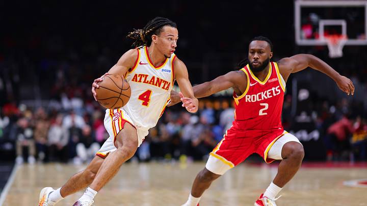Oct 24, 2026; Atlanta, Georgia, USA; Atlanta Hawks guard Kingston Flemings (4) dribbles against Houston Rockets guard Bruce Thornton (2) in the second quarter at State Farm Arena. Mandatory Credit: Colin Hubbard-Imagn Images Oct 24, 2026; Atlanta, Georgia, USA; Atlanta Hawks guard Kingston Flemings (4) dribbles against Houston Rockets guard Bruce Thornton (2) in the second quarter at State Farm Arena. Mandatory Credit: Colin Hubbard-Imagn Images