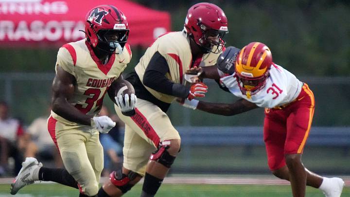 Cardinal Mooney running back Connail Jackson (34) carries the ball against Clearwater Central Catholic on Oct. 2, 2026. The Cougars trail Lakeland by 0.05 rating points for Florida’s final projected Open Division spot. Cardinal Mooney running back Connail Jackson (34) carries the ball against Clearwater Central Catholic on Oct. 2, 2026. The Cougars trail Lakeland by 0.05 rating points for Florida’s final projected Open Division spot.