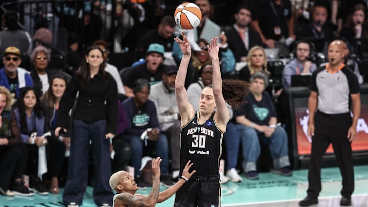 Oct 20, 2024; Brooklyn, New York, USA; New York Liberty forward Breanna Stewart (30) shoots over Minnesota Lynx guard Courtney Williams (10) in the first quarter during game five of the 2024 NBA Finals at Barclays Center. Mandatory Credit: Wendell Cruz-Imagn Images