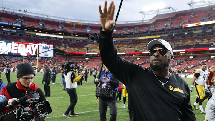 Nov 10, 2024; Landover, Maryland, USA; Pittsburgh Steelers head coach Mike Tomlin celebrates while leaving the field after the Steelers' game against the Washington Commanders at Northwest Stadium. Mandatory Credit: Geoff Burke-Imagn Images
