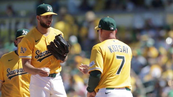 Apr 4, 2026; West Sacramento, California, USA; Athletics manager Mark Kotsay (7) pulls Athletics pitcher Luis Morales (19) out of the game during the fourth inning against the Houston Astros at Sutter Health Park. Mandatory Credit: Scott Marshall-Imagn Images Apr 4, 2026; West Sacramento, California, USA; Athletics manager Mark Kotsay (7) pulls Athletics pitcher Luis Morales (19) out of the game during the fourth inning against the Houston Astros at Sutter Health Park. Mandatory Credit: Scott Marshall-Imagn Images