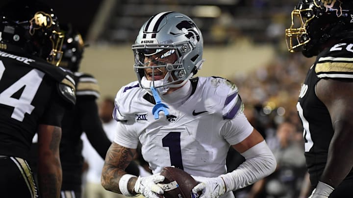 Oct 12, 2024; Boulder, Colorado, USA; Kansas State Wildcats wide receiver Jayce Brown (1) celebrates after a touchdown during the second half against the Colorado Buffaloes at Folsom Field. Mandatory Credit: Christopher Hanewinckel-Imagn Images