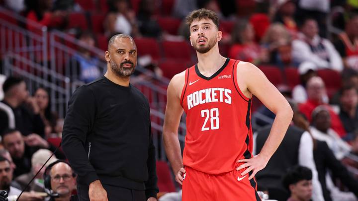 Dec 11, 2025; Houston, Texas, USA; Houston Rockets head coach Ime Udoka and center Alperen Sengun (28) look to the court during the third quarter against the Los Angeles Clippers at Toyota Center. Mandatory Credit: Troy Taormina-Imagn Images