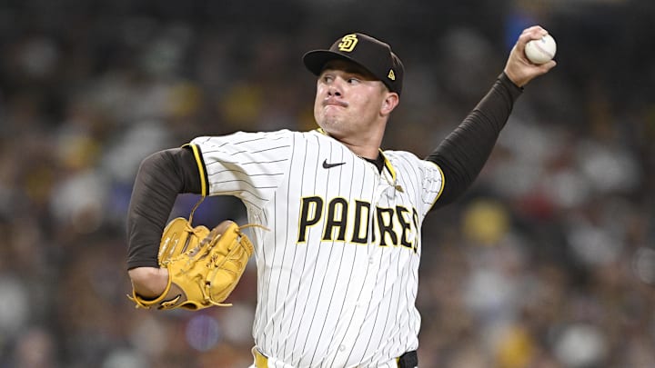 Sep 8, 2025; San Diego, California, USA; San Diego Padres relief pitcher Adrian Morejon (50) delivers during the seventh inning against the Cincinnati Reds at Petco Park. Mandatory Credit: Denis Poroy-Imagn Images