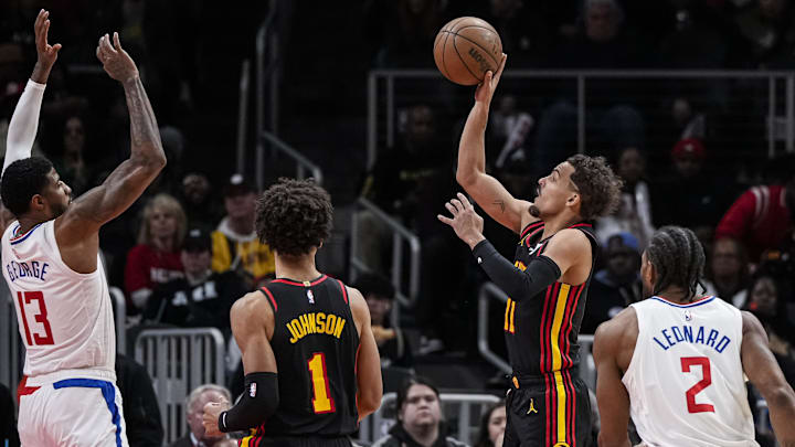 Feb 5, 2024; Atlanta, Georgia, USA; Atlanta Hawks guard Trae Young (11) shoots against the LA Clippers during the second half at State Farm Arena. Mandatory Credit: Dale Zanine-Imagn Images