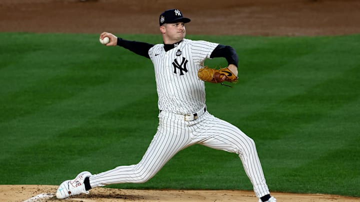 New York Yankees pitcher Clarke Schmidt (36) throws during the first inning in game three of the 2024 MLB World Series against the Los Angeles Dodgers at Yankee Stadium.