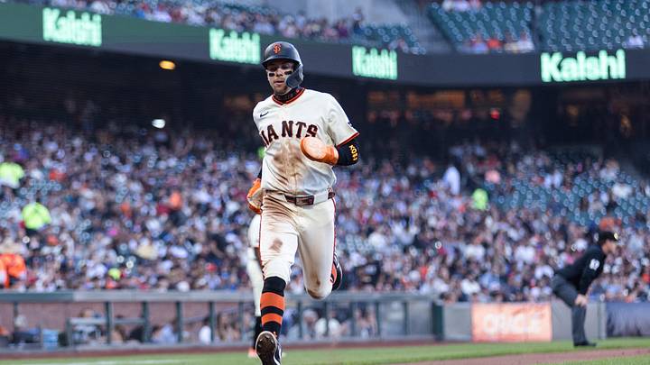 Sep 7, 2026; San Francisco, California, USA;  San Francisco Giants shortstop Christian Koss (50) scores a run on an RBI sacrifice fly hit by infielder Bryce Eldridge (not pictured) against the St. Louis Cardinals during the third inning at Oracle Park.  Mandatory Credit: John Hefti-Imagn Images