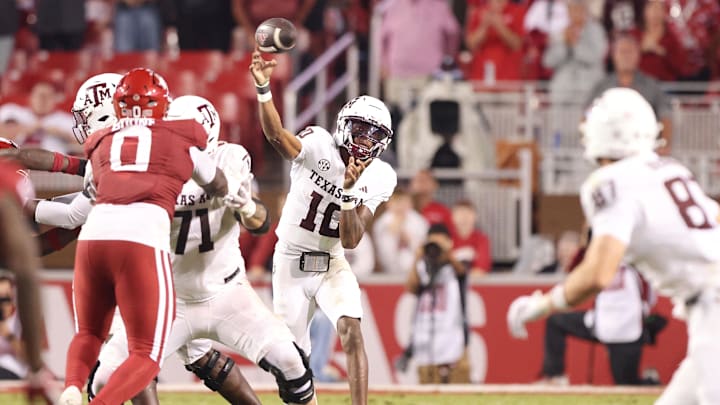 Texas A&M Aggies quarterback Marcel Reed (10) passes in the fourth quarter against the Arkansas Razorbacks at Donald W. Reynolds Razorback Stadium. Texas A&M Aggies quarterback Marcel Reed (10) passes in the fourth quarter against the Arkansas Razorbacks at Donald W. Reynolds Razorback Stadium.
