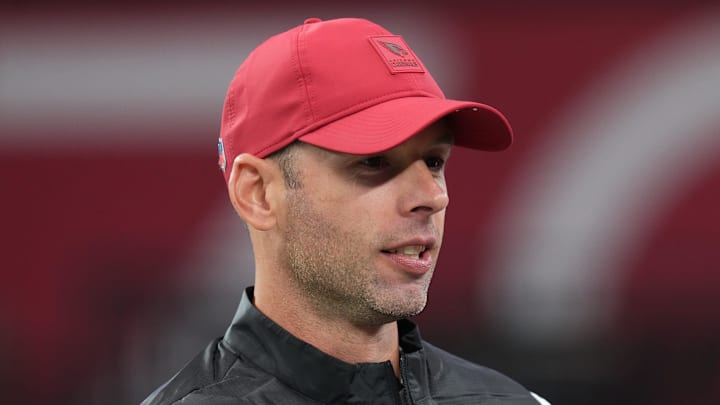 Arizona Cardinals head coach Jonathan Gannon embraces team owner Michael Bidwill before the team plays the Jacksonville Jaguars at State Farm Stadium on Nov. 23, 2025.