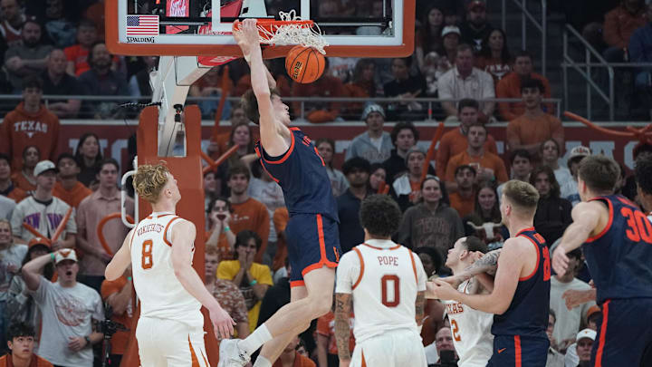 Dec 3, 2025; Austin, Texas, USA; Virginia Cavaliers center Johann Grunloh (17) dunks against Texas Longhorns center Matas Vokietaitis (8) during the first half at Moody Center. Mandatory Credit: Dustin Safranek-Imagn Images Dec 3, 2025; Austin, Texas, USA; Virginia Cavaliers center Johann Grunloh (17) dunks against Texas Longhorns center Matas Vokietaitis (8) during the first half at Moody Center. Mandatory Credit: Dustin Safranek-Imagn Images