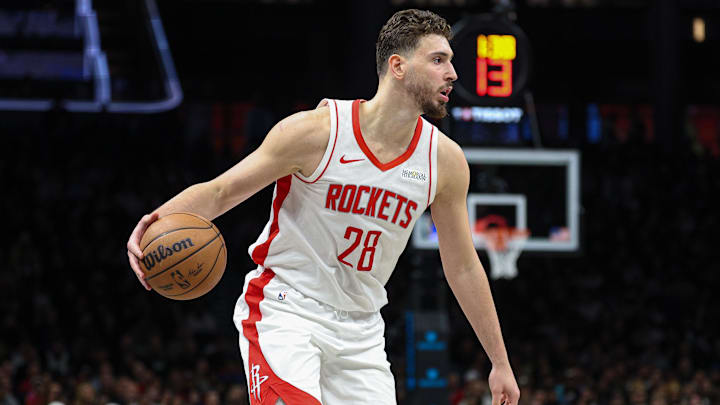 Jan 1, 2026; Brooklyn, New York, USA; Houston Rockets center Alperen Sengun (28) dribbles during the second half against the Brooklyn Nets at Barclays Center. Mandatory Credit: Vincent Carchietta-Imagn Images