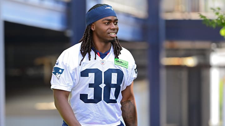 Jul 26, 2023; Foxborough, MA, USA; New England Patriots running back Rhamondre Stevenson (38) makes his way to the practice fields for training camp at Gillette Stadium. Mandatory Credit: Eric Canha-Imagn Images Jul 26, 2023; Foxborough, MA, USA; New England Patriots running back Rhamondre Stevenson (38) makes his way to the practice fields for training camp at Gillette Stadium. Mandatory Credit: Eric Canha-Imagn Images