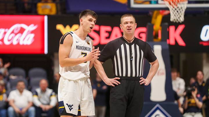 Mar 6, 2024; Morgantown, West Virginia, USA; West Virginia Mountaineers guard Kerr Kriisa (3) talks to an official during the first half against the TCU Horned Frogs at WVU Coliseum. Mandatory Credit: Ben Queen-USA TODAY Sports Mar 6, 2024; Morgantown, West Virginia, USA; West Virginia Mountaineers guard Kerr Kriisa (3) talks to an official during the first half against the TCU Horned Frogs at WVU Coliseum. Mandatory Credit: Ben Queen-USA TODAY Sports