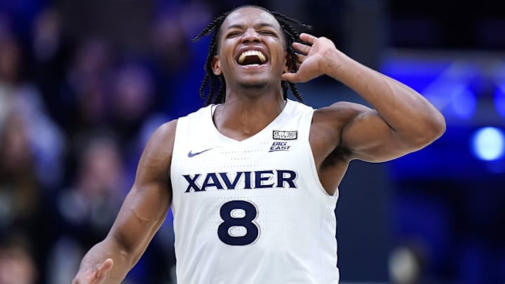 Xavier Musketeers guard Quincy Olivari (8) reacts after making a 3-point shot in the second half of