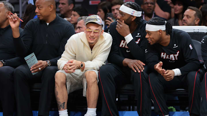 Oct 6, 2025; Miami, Florida, USA; Miami Heat guard Tyler Herro (14) watches from the bench against the Milwaukee Bucks during the first quarter at Kaseya Center. Mandatory Credit: Sam Navarro-Imagn Images Oct 6, 2025; Miami, Florida, USA; Miami Heat guard Tyler Herro (14) watches from the bench against the Milwaukee Bucks during the first quarter at Kaseya Center. Mandatory Credit: Sam Navarro-Imagn Images