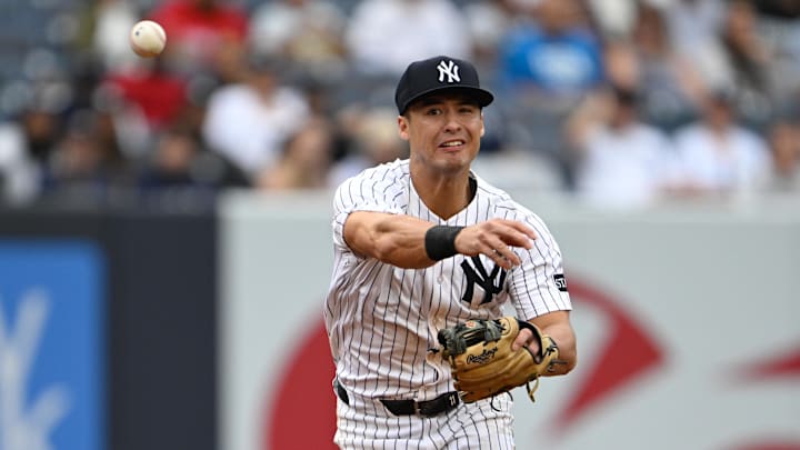 Sep 7, 2025; Bronx, New York, USA; New York Yankees shortstop Anthony Volpe (11) throws the ball during the sixth inning against the Toronto Blue Jays at Yankee Stadium. Mandatory Credit: Mark Smith-Imagn Images