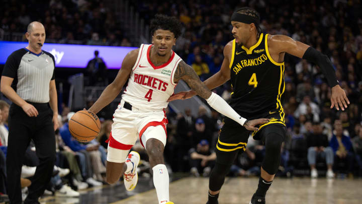 Nov 20, 2023; San Francisco, California, USA; Houston Rockets guard Jalen Green (4) dribbles against Golden State Warriors forward Moses Moody (4)