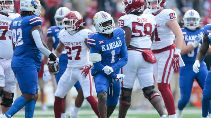 Kansas senior safety Kenny Logan Jr. (1) reacts after making a tackle against Oklahoma in the first