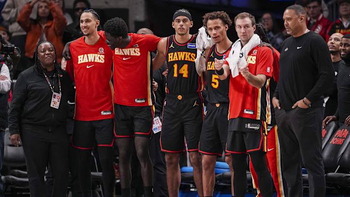 Dec 21, 2025; Atlanta, Georgia, USA; The Atlanta Hawks bench watches the game against the Chicago Bulls during the second half at State Farm Arena. Mandatory Credit: Dale Zanine-Imagn Images