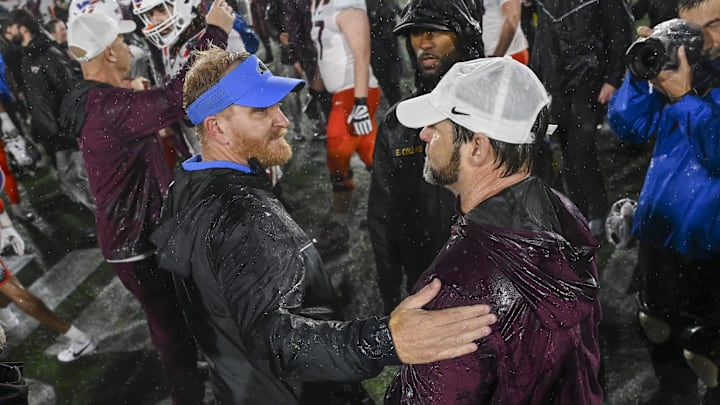 Dec 27, 2023; Annapolis, MD, USA; Tulane Green Wave head coach interim Slade Nagle speaks with Virginia Tech Hokies head coach Brent Pry after the game at Navy-Marine Corps Memorial Stadium. Mandatory Credit: Tommy Gilligan-Imagn Images Dec 27, 2023; Annapolis, MD, USA; Tulane Green Wave head coach interim Slade Nagle speaks with Virginia Tech Hokies head coach Brent Pry after the game at Navy-Marine Corps Memorial Stadium. Mandatory Credit: Tommy Gilligan-Imagn Images