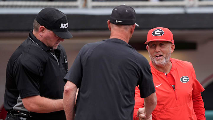 Georgia coach Wes Johnson shakes hands with Binghamton coach Tim Sinicki before the start of a NCAA Regionals game against Binghamton in Athens, Ga., on Friday, May 30, 2025.