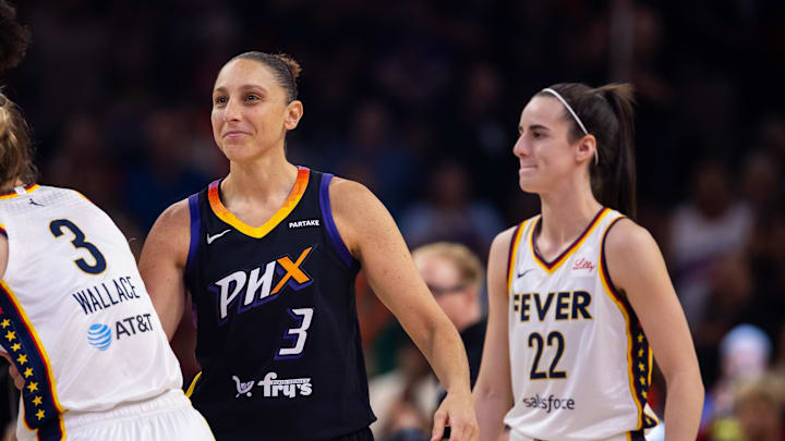 Jun 30, 2024; Phoenix, Arizona, USA; Indiana Fever guard Caitlin Clark (22) against Phoenix Mercury guard Diana Taurasi (3) during a WNBA game at Footprint Center. Mandatory Credit: Mark J. Rebilas-Imagn Images
