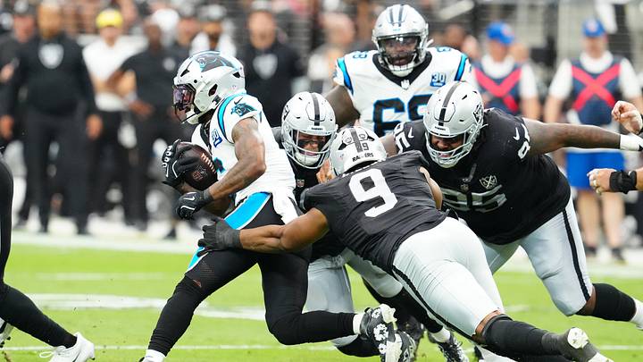 Sep 22, 2024; Paradise, Nevada, USA; Carolina Panthers running back Miles Sanders (6) gains yardage against the Las Vegas Raiders during the second quarter at Allegiant Stadium. Mandatory Credit: Stephen R. Sylvanie-Imagn Images