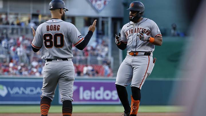 Apr 17, 2026; Washington, District of Columbia, USA; San Francisco Giants left fielder Heliot Ramos (17) celebrates with Giants third base coach Hector Borg (80) while rounding the bases after hitting a three run home run against the Washington Nationals during the second inning at Nationals Park. Mandatory Credit: Geoff Burke-Imagn Images