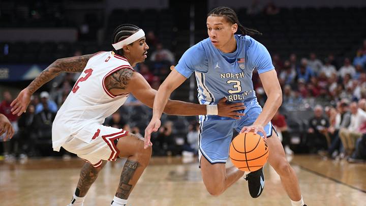 Oct 18, 2026; Indianapolis, IN, USA;  North Carolina Tar Heels guard Matt Able (3) dribbles against Indiana Hoosiers guard Bryce Lindsay (2) during the first half at Gainbridge Fieldhouse.  Mandatory Credit: Robert Goddin-Imagn Images
