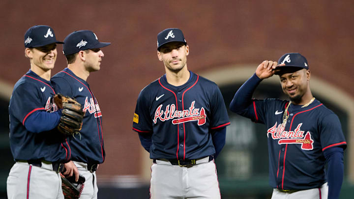 Jun 6, 2025; San Francisco, California, USA; Atlanta Braves infielders, from left, Austin Riley (27), Luke Williams (37), Matt Olson (28) and Ozzie Albies (1) look on during a pitching change against the San Francisco Giants during the ninth inning at Oracle Park. Mandatory Credit: Robert Edwards-Imagn Images