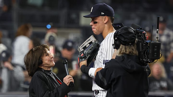 New York Yankees right fielder Aaron Judge (99) is interviewed by Yankees radio announcer Suzyn Waldman after the game against the Arizona Diamondbacks at Yankee Stadium in 2023.