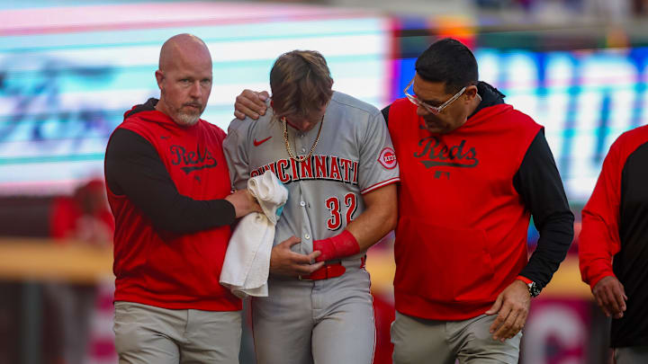 May 5, 2025; Atlanta, Georgia, USA; Cincinnati Reds left fielder Tyler Callihan (32) leaves the game with an injury against the Atlanta Braves in the third inning at Truist Park. Mandatory Credit: Brett Davis-Imagn Images May 5, 2025; Atlanta, Georgia, USA; Cincinnati Reds left fielder Tyler Callihan (32) leaves the game with an injury against the Atlanta Braves in the third inning at Truist Park. Mandatory Credit: Brett Davis-Imagn Images