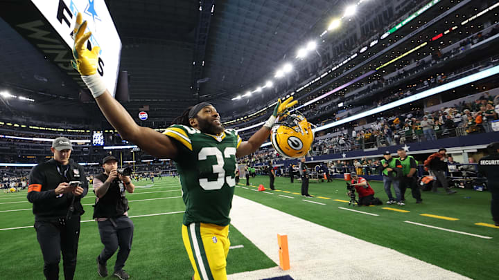 Jan 14, 2024; Arlington, Texas, USA; Green Bay Packers running back Aaron Jones (33) reacts after