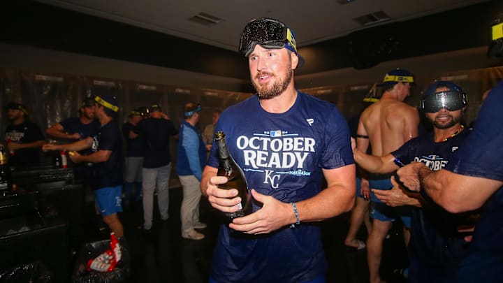 Sep 27, 2024; Atlanta, Georgia, USA; Kansas City Royals right fielder Hunter Renfroe (16) celebrates after clinching a wild card playoff birth after a game against the Atlanta Braves at Truist Park. Mandatory Credit: Brett Davis-Imagn Images Sep 27, 2024; Atlanta, Georgia, USA; Kansas City Royals right fielder Hunter Renfroe (16) celebrates after clinching a wild card playoff birth after a game against the Atlanta Braves at Truist Park. Mandatory Credit: Brett Davis-Imagn Images
