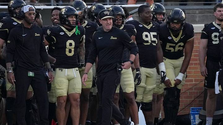 Wake Forest Demon Deacons head coach Jake Dickert on the sideline against the Akron Zips during the first half at Allegacy Federal Credit Union Stadium. Wake Forest Demon Deacons head coach Jake Dickert on the sideline against the Akron Zips during the first half at Allegacy Federal Credit Union Stadium.