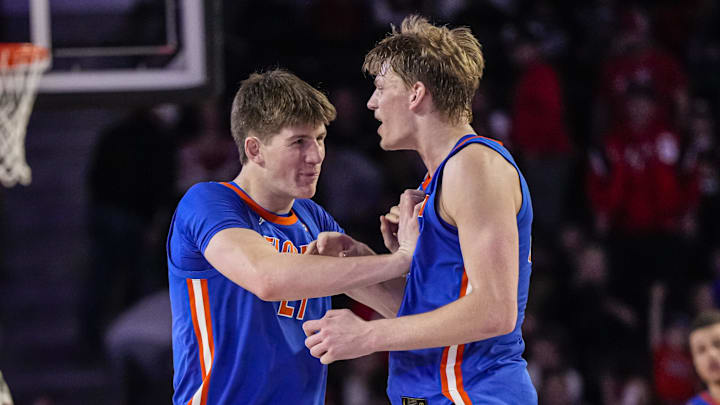Feb 17, 2024; Athens, Georgia, USA; Florida Gators forwards Alex Condon (21) and Thomas Haugh (10) react after defeating the Georgia Bulldogs at Stegeman Coliseum. Mandatory Credit: Dale Zanine-Imagn Images