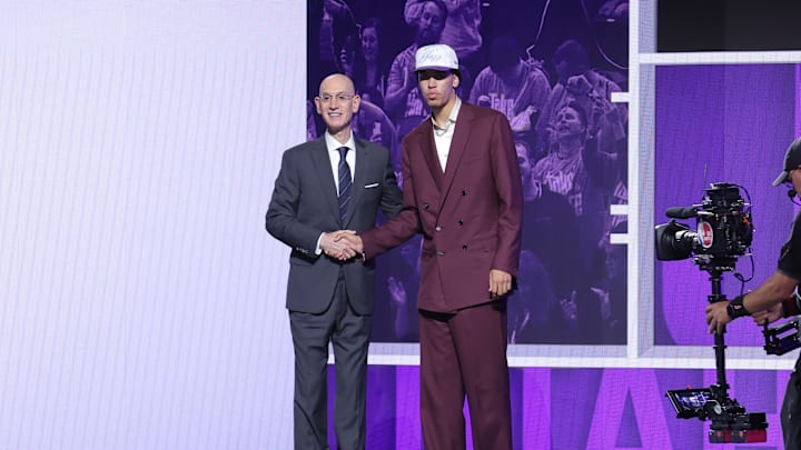 Jun 25, 2025; Brooklyn, NY, USA; Will Riley stands with NBA commissioner Adam Silver after being selected as the 21st pick by the Utah Jazz in the first round of the 2025 NBA Draft at Barclays Center. Mandatory Credit: Brad Penner-Imagn Images Jun 25, 2025; Brooklyn, NY, USA; Will Riley stands with NBA commissioner Adam Silver after being selected as the 21st pick by the Utah Jazz in the first round of the 2025 NBA Draft at Barclays Center. Mandatory Credit: Brad Penner-Imagn Images