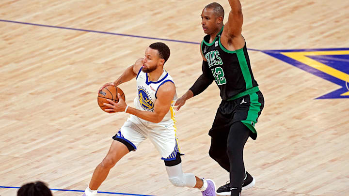 Jun 13, 2022; San Francisco, California, USA; Golden State Warriors guard Stephen Curry (30) drives to the basket against Boston Celtics center Al Horford (42) in game five of the 2022 NBA Finals at Chase Center. Mandatory Credit: Cary Edmondson-Imagn Images