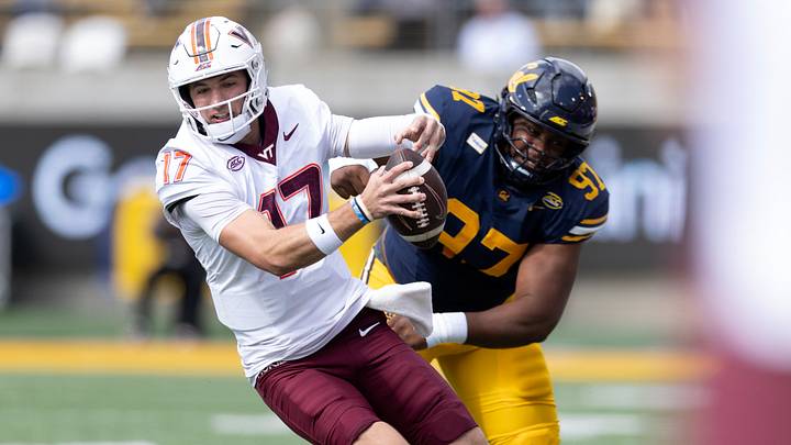 Oct 10, 2026; Berkeley, Calif.; Virginia Tech quarterback Ethan Grunkemeyer (17) scrambles away from Cal defensive lineman Michael-Anthony Okwura (97). Oct 10, 2026; Berkeley, Calif.; Virginia Tech quarterback Ethan Grunkemeyer (17) scrambles away from Cal defensive lineman Michael-Anthony Okwura (97).