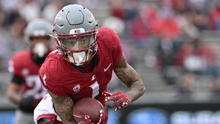 Oct 19, 2024; Pullman, Washington, USA; Washington State Cougars wide receiver Kris Hutson (1) carries the ball after a catch against the Hawaii Warriors in the second half at Gesa Field at Martin Stadium. Washington State won 42-10. Mandatory Credit: James Snook-Imagn Images