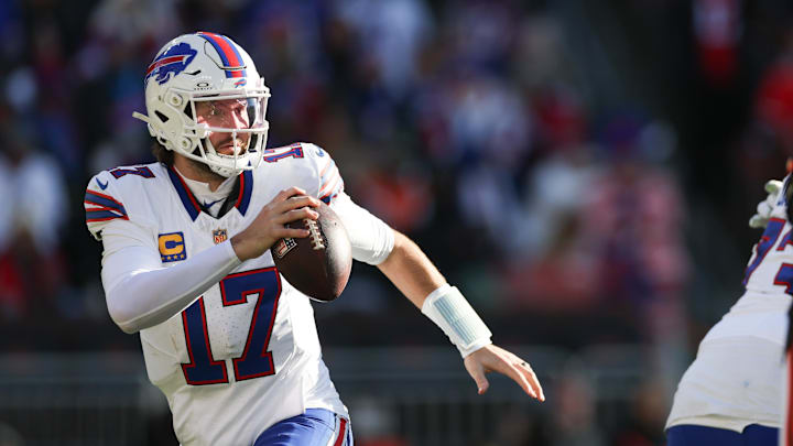 Dec 21, 2025; Cleveland, Ohio, USA;  Buffalo Bills quarterback Josh Allen (17) looks downfield against the Cleveland Browns during the first half at Huntington Bank Field. 