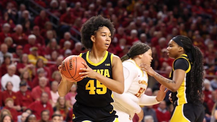Dec 10, 2025; Ames, Iowa, USA; Iowa Hawkeyes Hannah Stuelke (45) grabs a rebound against the Iowa State Cyclones during the first half at James H. Hilton Coliseum. Mandatory Credit: Reese Strickland-Imagn Images Dec 10, 2025; Ames, Iowa, USA; Iowa Hawkeyes Hannah Stuelke (45) grabs a rebound against the Iowa State Cyclones during the first half at James H. Hilton Coliseum. Mandatory Credit: Reese Strickland-Imagn Images
